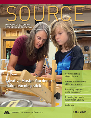 Cover of Source Fall 2022. Main story is "Creative Master Gardeners make learning stick." Photo shows Master Gardener volunteer teaching a child how to use a loom.