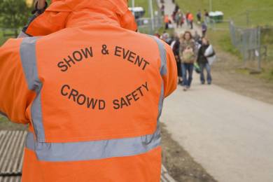 A person managing crowd safety at an event