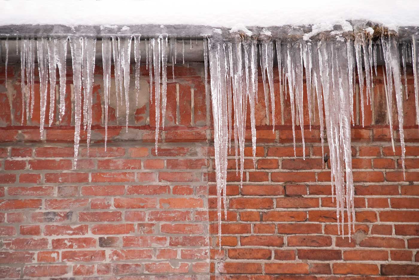 Icicles on roof, ice dam.