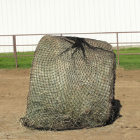 Cinch net wrapped around round bale.