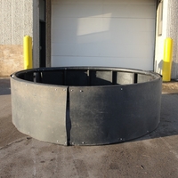 Solid poly ring feeder for round bales.