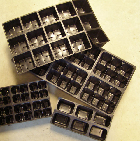 Cell flats with containers for individual seedlings