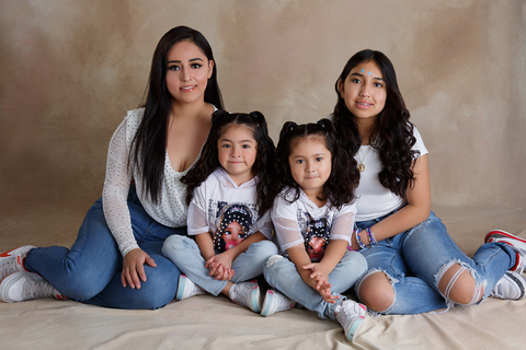 A family photo of Tatiana and her three daughters