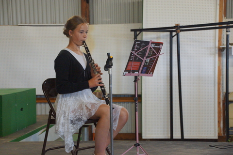 Abigail S. playing clarinet at Isanti County Fair
