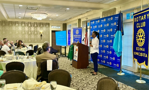 Ndlovu speaking at a Rotary club event in Minnesota.