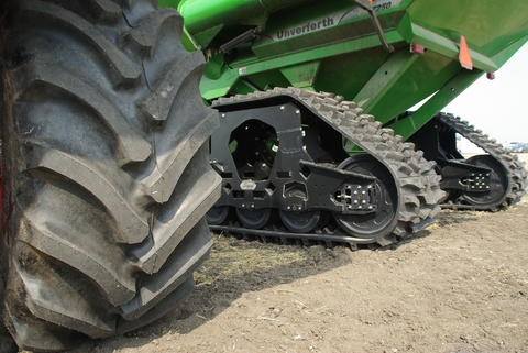 tractor wheel and tractor with tracks.
