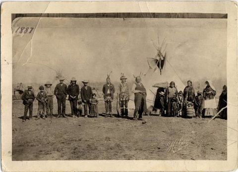 Native American families at the Ross Indian Village, Dieter Township, Minnesota, in 1887.
