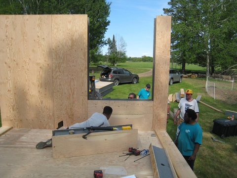 Men working on building the home.