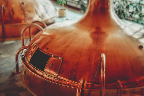 Close up of copper vats storing beer in a brewery.