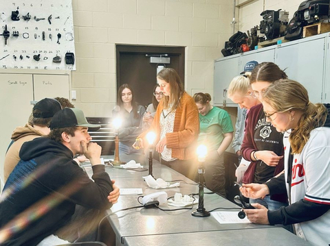 Heidi Auel teaching high school students in a science class