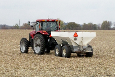 Tractor spreading urea