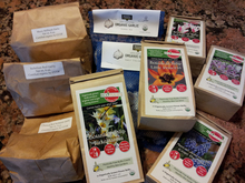 Packages and bags labeled for different types of bulbs.