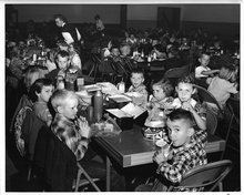 Kids eating school lunch