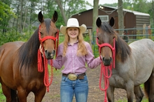 Leah Goldade with 2 horses
