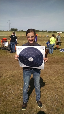 Girl holding target