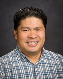 Professional headshot of Extension Educator Dung Mao