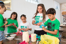 Youth working on craft project.