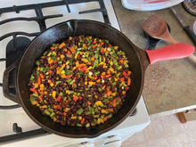Beans and veggies dish in skillet