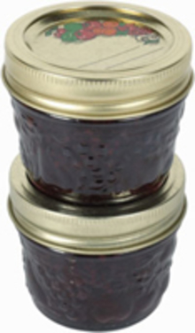 Sandcherry jelly in stacked jars.