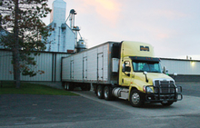 Semi truck in warehouse parking lot