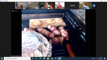 Zoom meeting screen showing brats and other foods