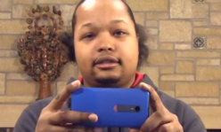 man taking video with smartphone
