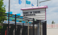 A Minnesota State Fair grounds sign reads 'Hang in there Minnesota'