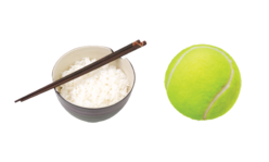 Bowl of rice and a tennis ball symbolizing a serving size