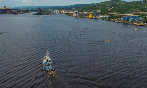 The boat, Blue Heron, sails in Duluth Harbor.