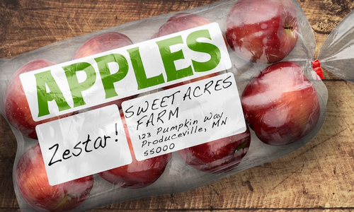 Plastic bag of apples with labels: "Zestar!" and "Sweet Acres Farm, 123 Pumpkin Way, Produceville, MN 55000."