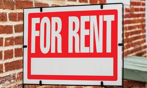 Sign reading "for rent"