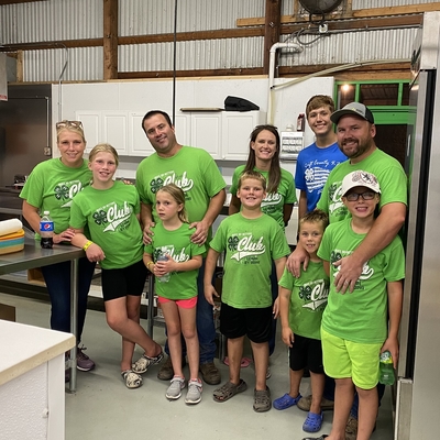 4-H youth and parents working in food stand