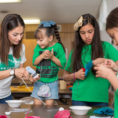 4-H youth working on craft