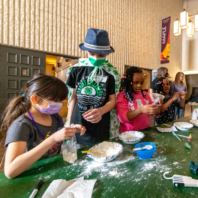 Group of 4-H'ers doing a craft activity.