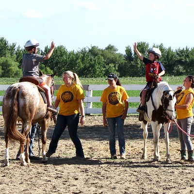Club members provide education about horses, and riding, and serve as support alongside the horses.