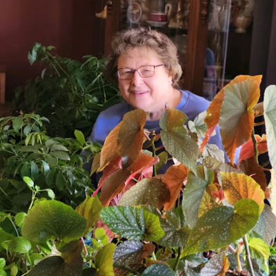 Janet Dolezal, McLeod County Master Gardener surounded by plants