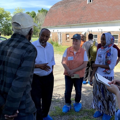 Somali community and farmers in central Minnesota at a goat farm.