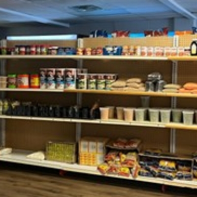 Shelves of non-perishable food items at Shashe Grocery