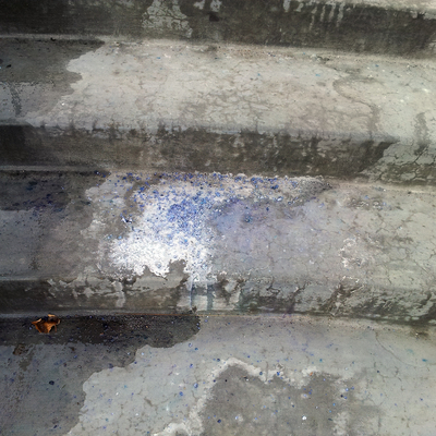 Pile of salt on cement steps.
