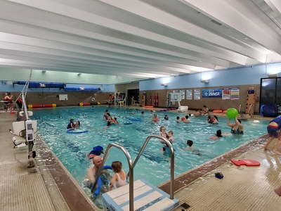 Kids swimming in an indoor pool