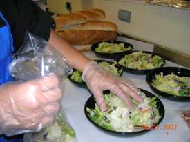 Glove use while making a salad.