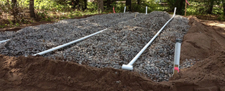 Installing a septic system. 